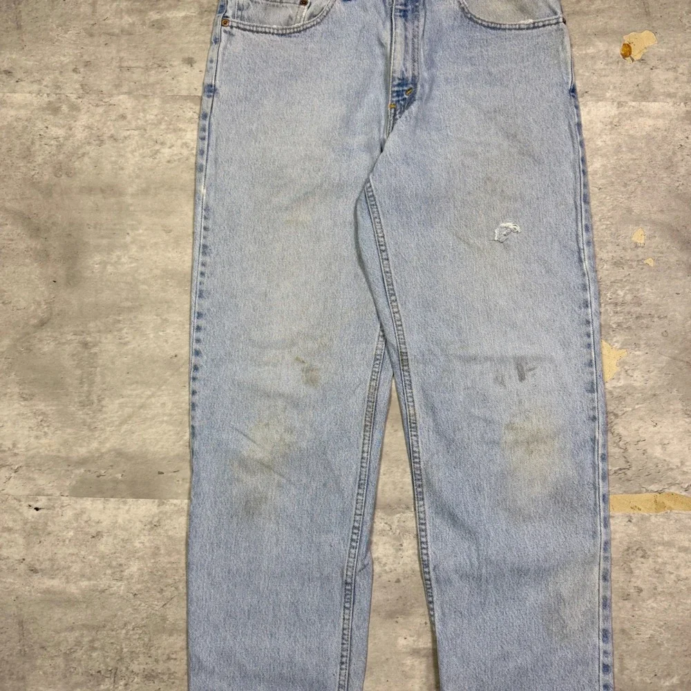 Vintage Levis 550 Relaxed Fit Tapered Light Wash Jeans Made in USA 34x32